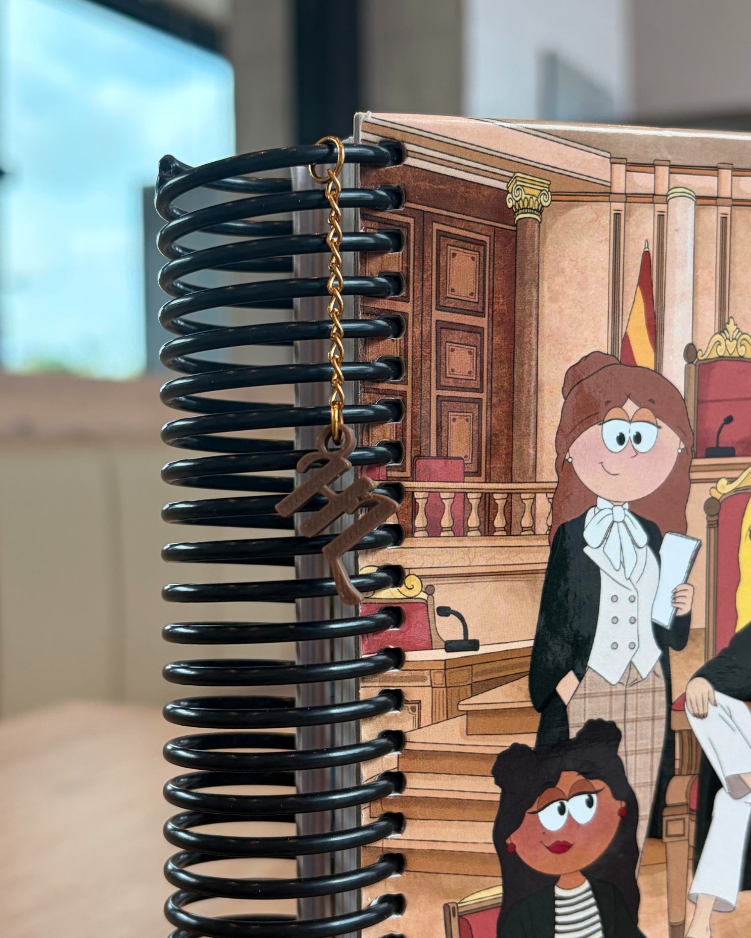 Detalle de la anilla y el charm de la Agenda HL